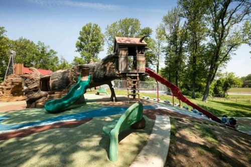 Image of Cre8Play Park. Playground with a log as a crawlspace.